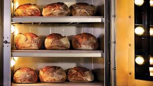bread baking in oven
